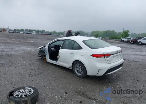 2021 Toyota Corolla Hybrid Le from USA, damaged, VIN JTDEAMDE7MJ009617